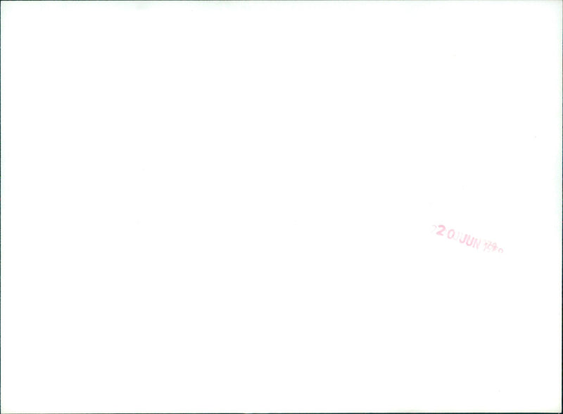 A Jaguar Series III body shell receives a coat of thermoplastic acrylic paint. - Vintage Photograph