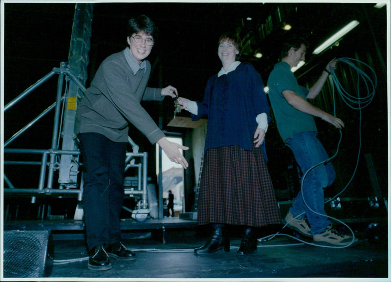 Catherine Mallyon, General Manager of The Playhouse, passes the keys to her successor, Alison Coates. - Vintage Photograph