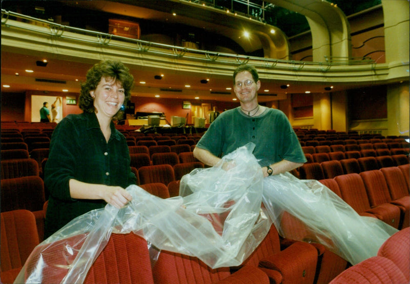 Front of House Manager Jonathan Nash and Assistant Sue Scarrott unveil newly refurbished seats at the Oxford Playhouse, while dancer Gill Clarke inspects the revamped dressing rooms and Joint Theatre Director Siobhan Tighe looks on. - Vintage Photograph