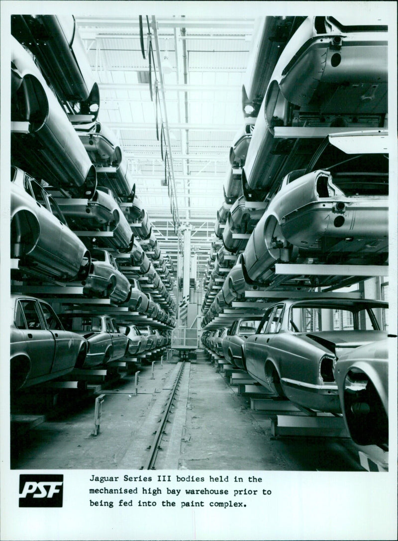 A mechanised high bay warehouse storing bodies of the Jaguar Series III cars. - Vintage Photograph