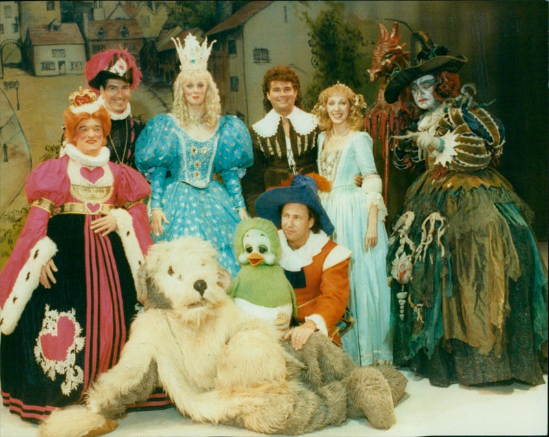 Cast members of the musical "Humpty Dumpty Add сору" pose for a photo with Keith Hairs and Oraille in the center. - Vintage Photograph