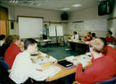 Employees and managers of Unipart participate in the company's in-house 'university', Unipart U. - Vintage Photograph