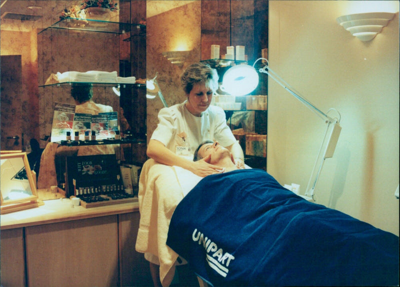 Sonia Sharman, a beautician at Unipart Group of Companies's health & fitness centre in Cowley, Oxford, poses in the Peach Room. - Vintage Photograph