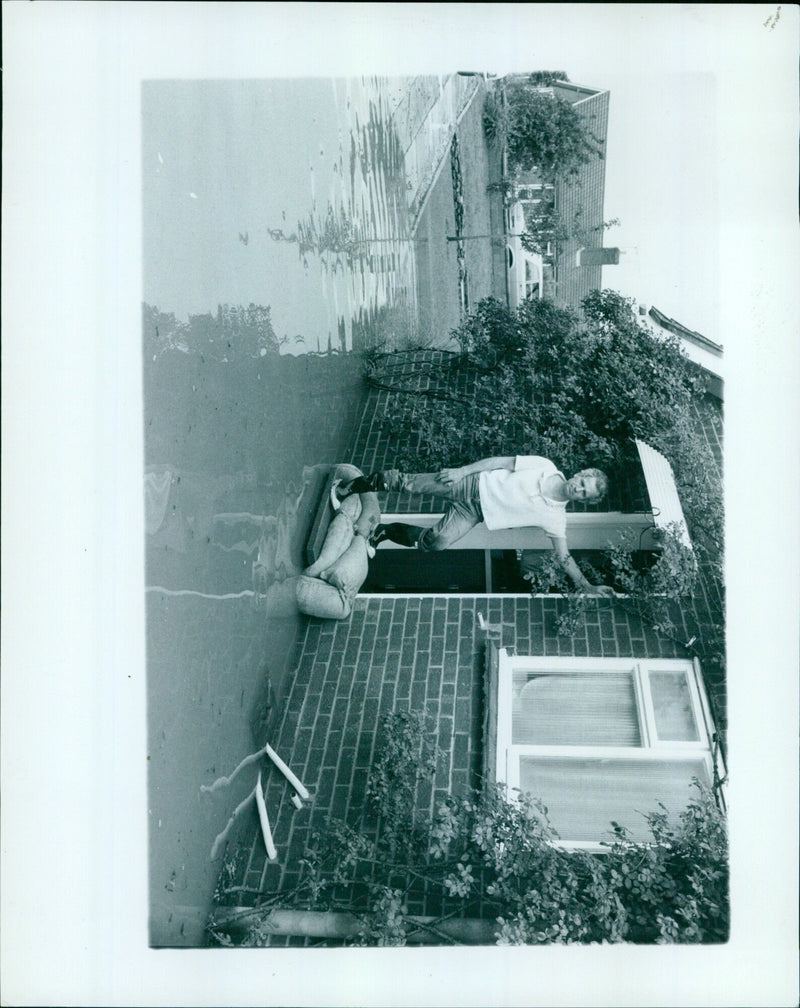 Residents survey the damage from a flood on their doorstep. - Vintage Photograph