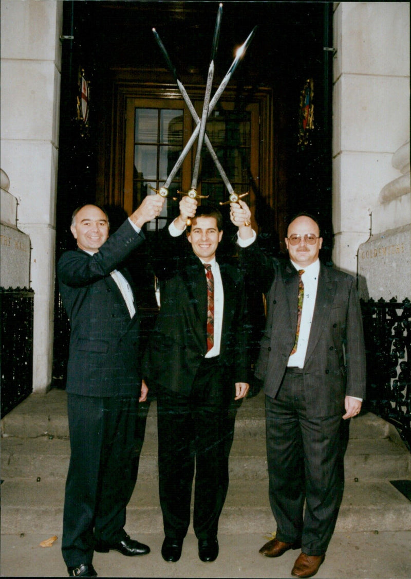 Unipart employees proudly display their British Safety Council Swords of Honour. - Vintage Photograph