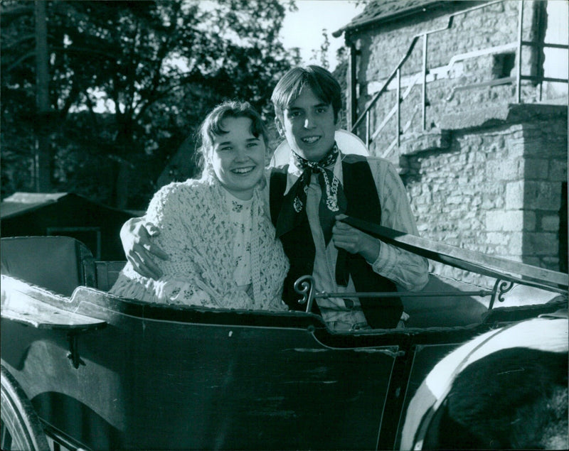 Janet Smith and Mark Nicholls in character during a performance of '2 Oxen Drama Playhouse'. - Vintage Photograph