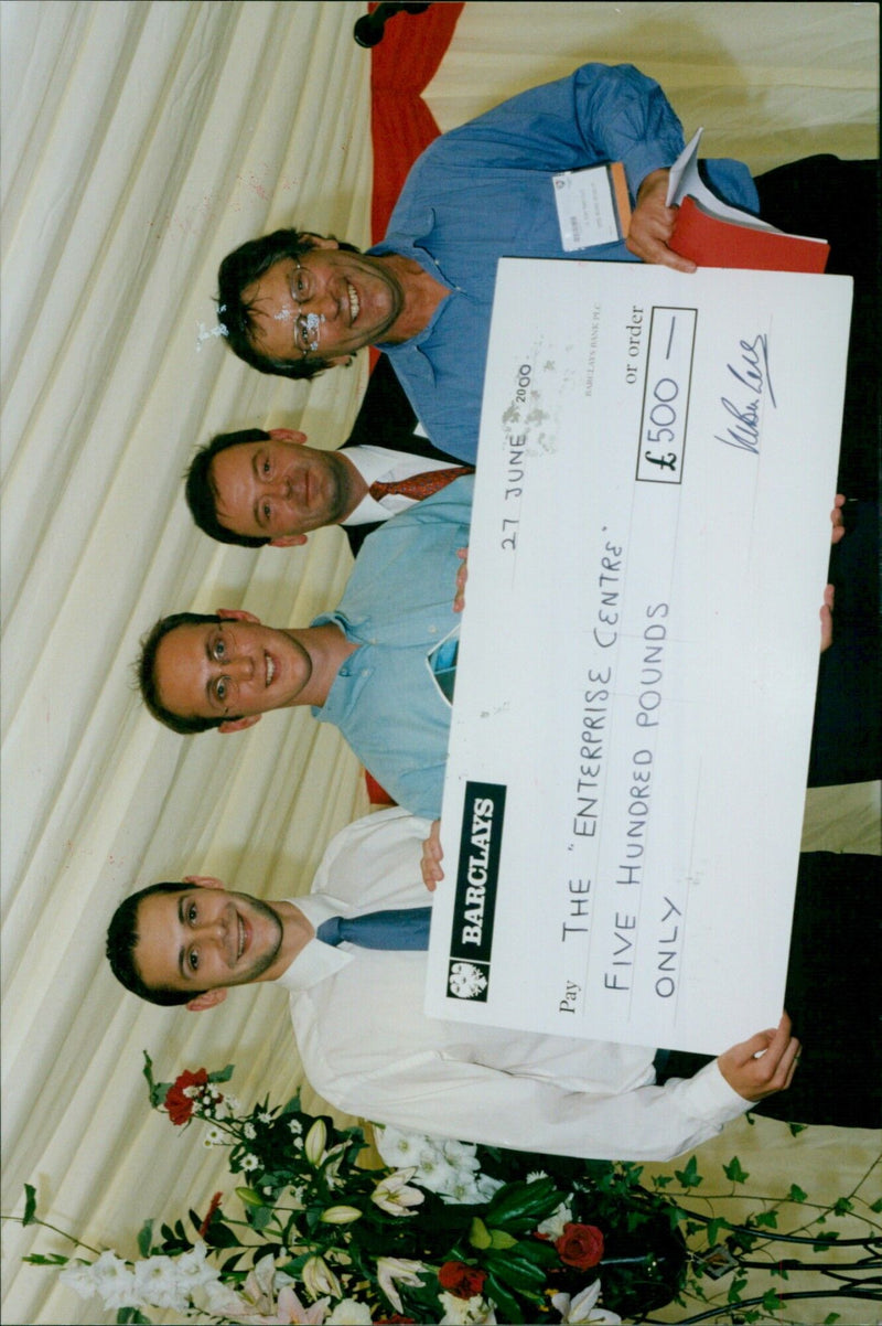 Dr Peter Johnson, Roger Mumby-Croft, and the founders of UNIque Students, David Ward and Stuart MacBride, celebrate winning the Venturefest 2000 Business Plan Clinic. - Vintage Photograph