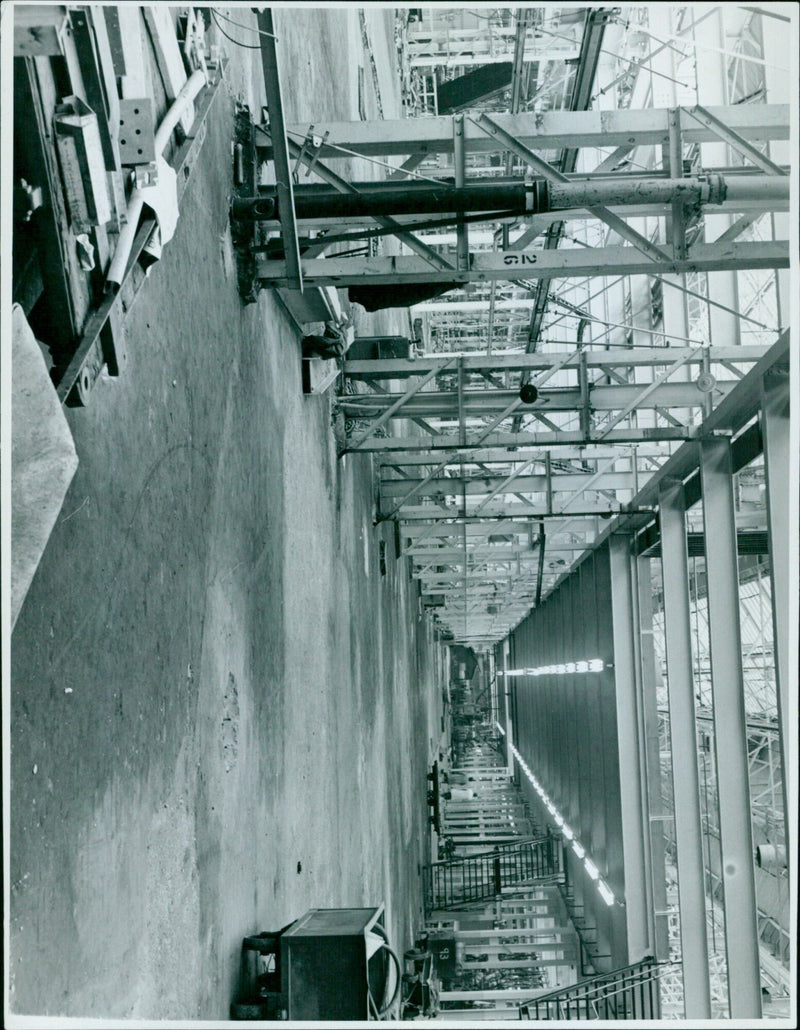 Construction workers build the Cowley Complex on March 19, 1971. - Vintage Photograph