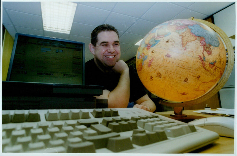 Darryl Mattocks, the boss of Travelstore.com, in his Cowley office. - Vintage Photograph