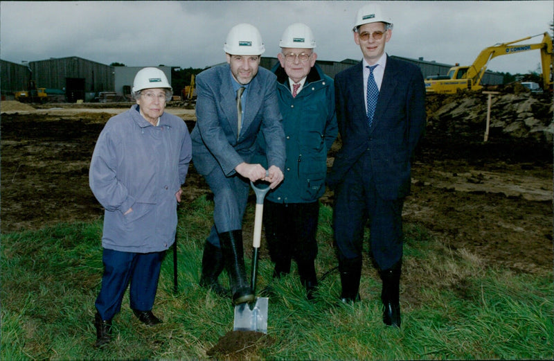 Timbmet Group Chairman Dan Kemp, Chief Executive Simon Fineman, and other company members celebrate the expansion of the Timbmet facility in Cumnor Hill. - Vintage Photograph