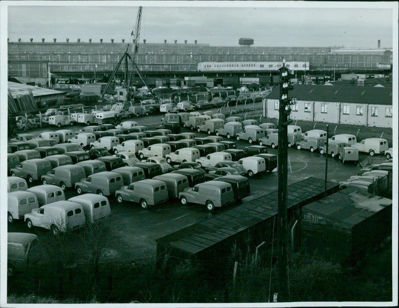 Car enthusiasts gather at the Nuffield Exports Morris Cowley Station. - Vintage Photograph