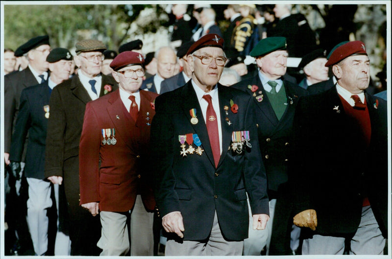 Members of the public pay their respects at a Remembrance Sunday service in St Giles. - Vintage Photograph