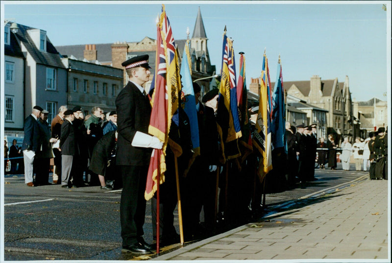 People gather to commemorate Remembrance Day in Oxford, England. - Vintage Photograph