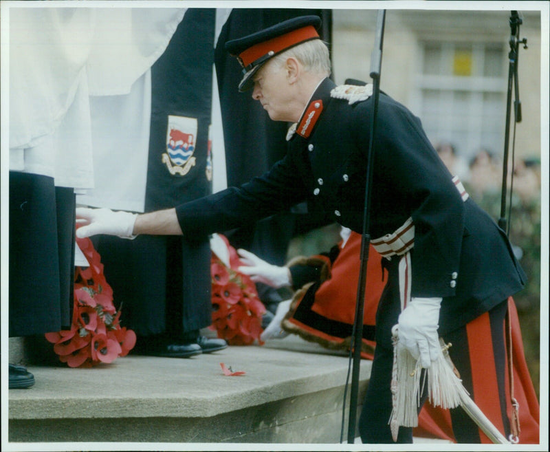 Members of the military and local dignitaries pay their respects at Stel Smith on Remembrance Sunday. - Vintage Photograph