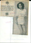 Birmingham model Penny tries on the latest t-shirt from Leyland Cars. - Vintage Photograph