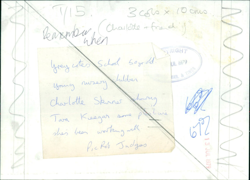 Charlotte Skriner shows two classmates a plant she has been growing. - Vintage Photograph