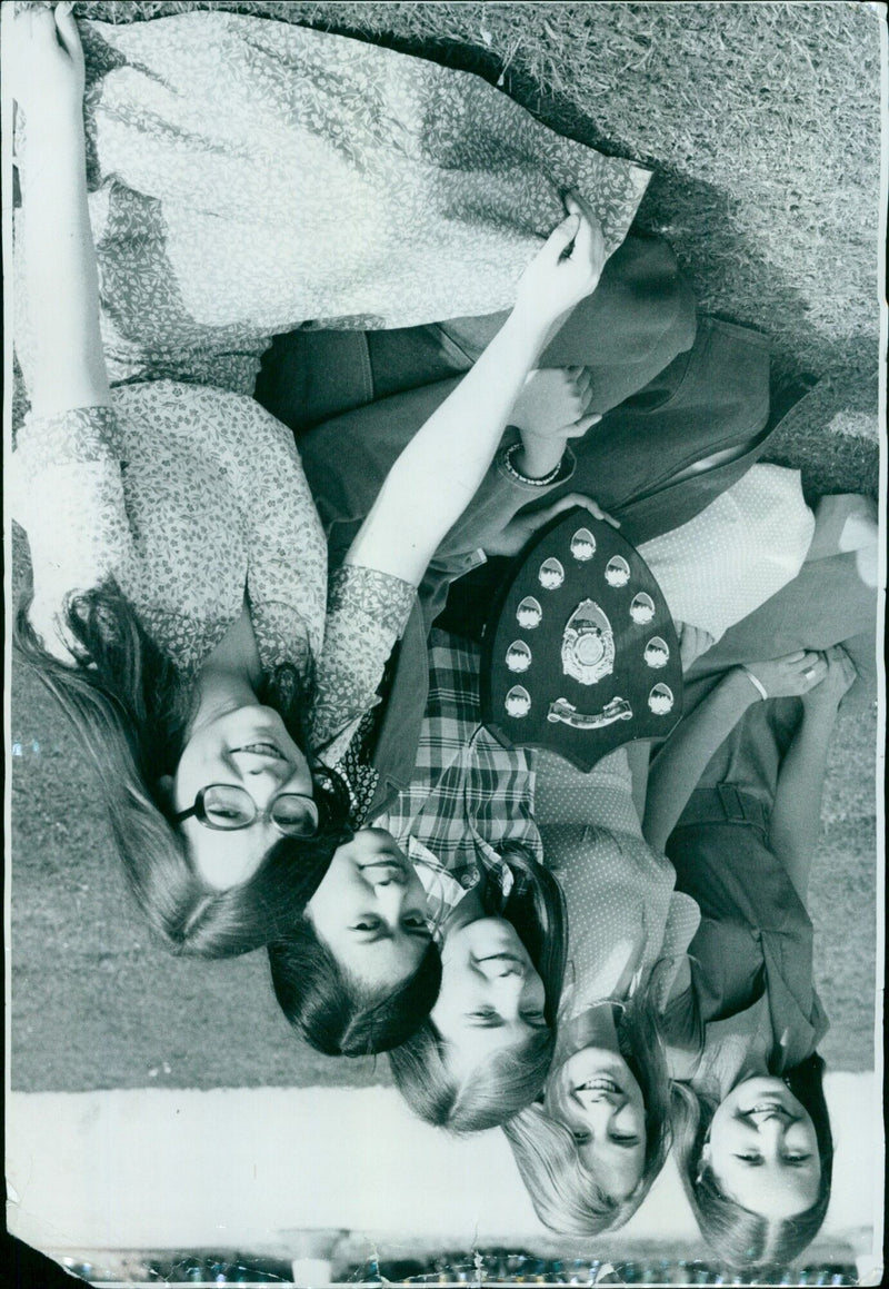 A group of people enjoying a day out at the Runda LAICO fair. - Vintage Photograph