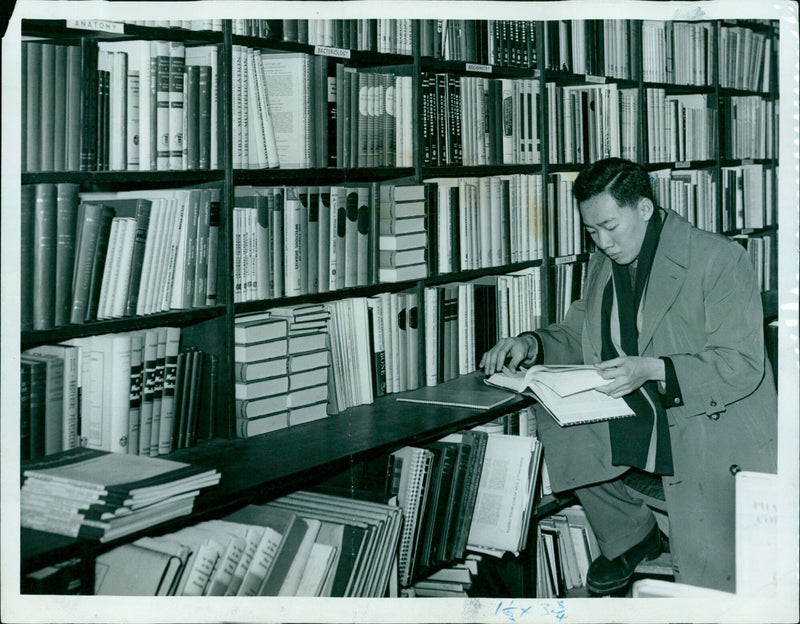 Scientists conducting research on infectious diseases, physiological chemistry, and bacteriology. - Vintage Photograph