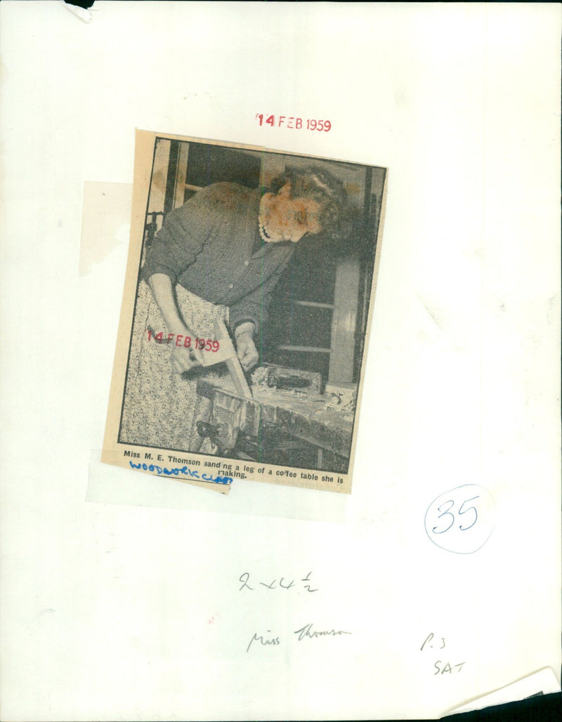 Miss M. E. Thomson sanding a leg of a coffee table. - Vintage Photograph