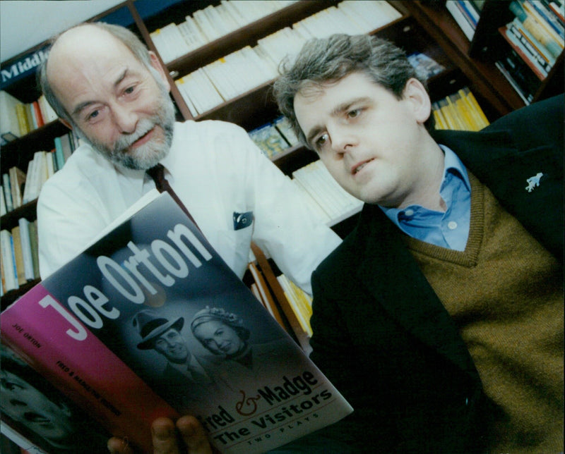 David Retter, manager of Blackwells 2nd Hand department, examines a script for two plays by Joe Orton. - Vintage Photograph