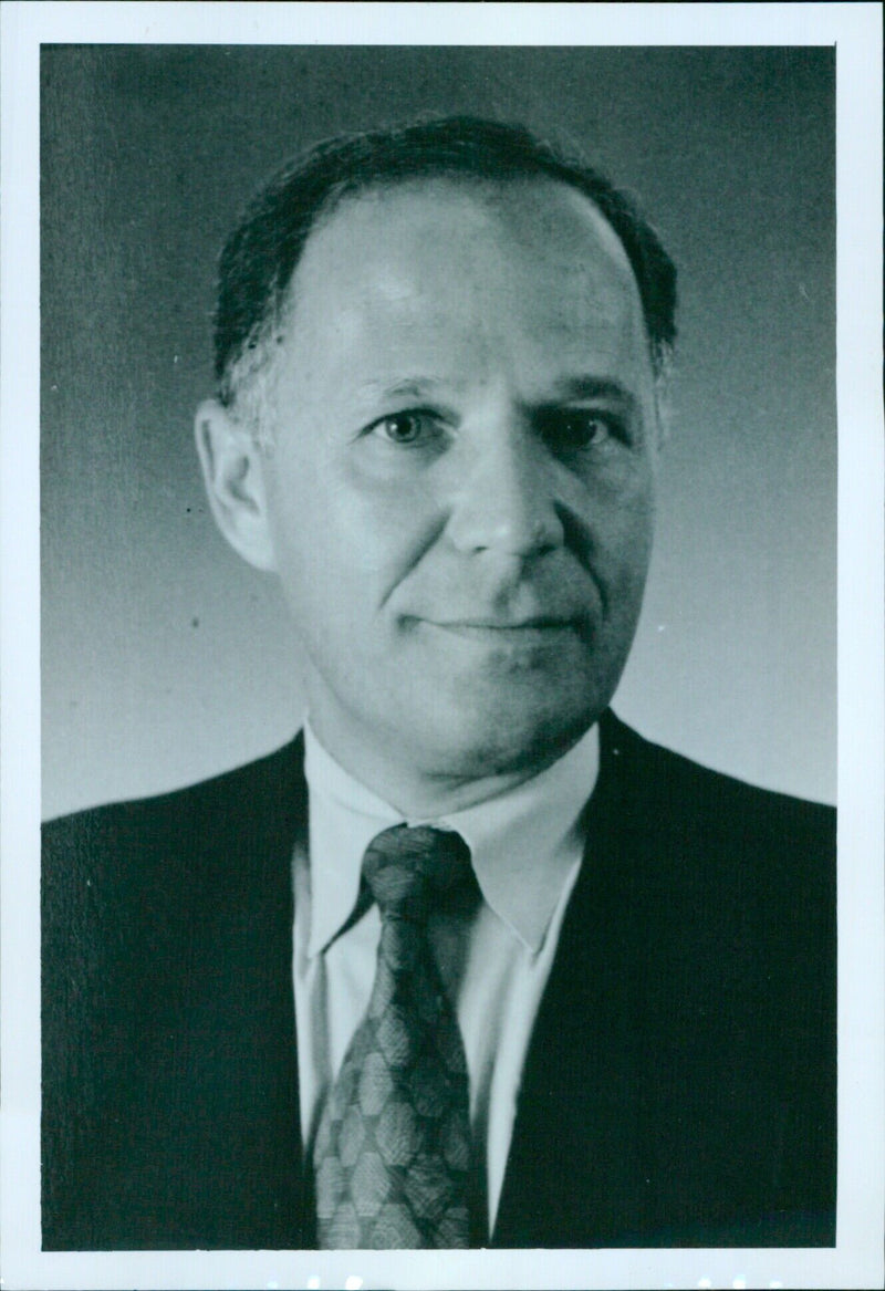 Dr Elliot Goldstein, Chief Executive Officer of British Biotech plc, poses for a photograph. - Vintage Photograph