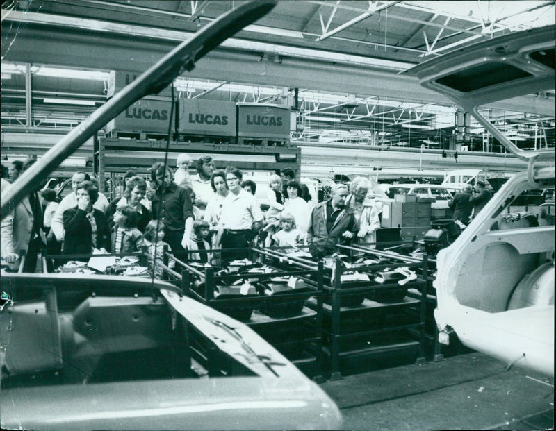 Visitors explore a production line during British Leyland Open Day. - Vintage Photograph