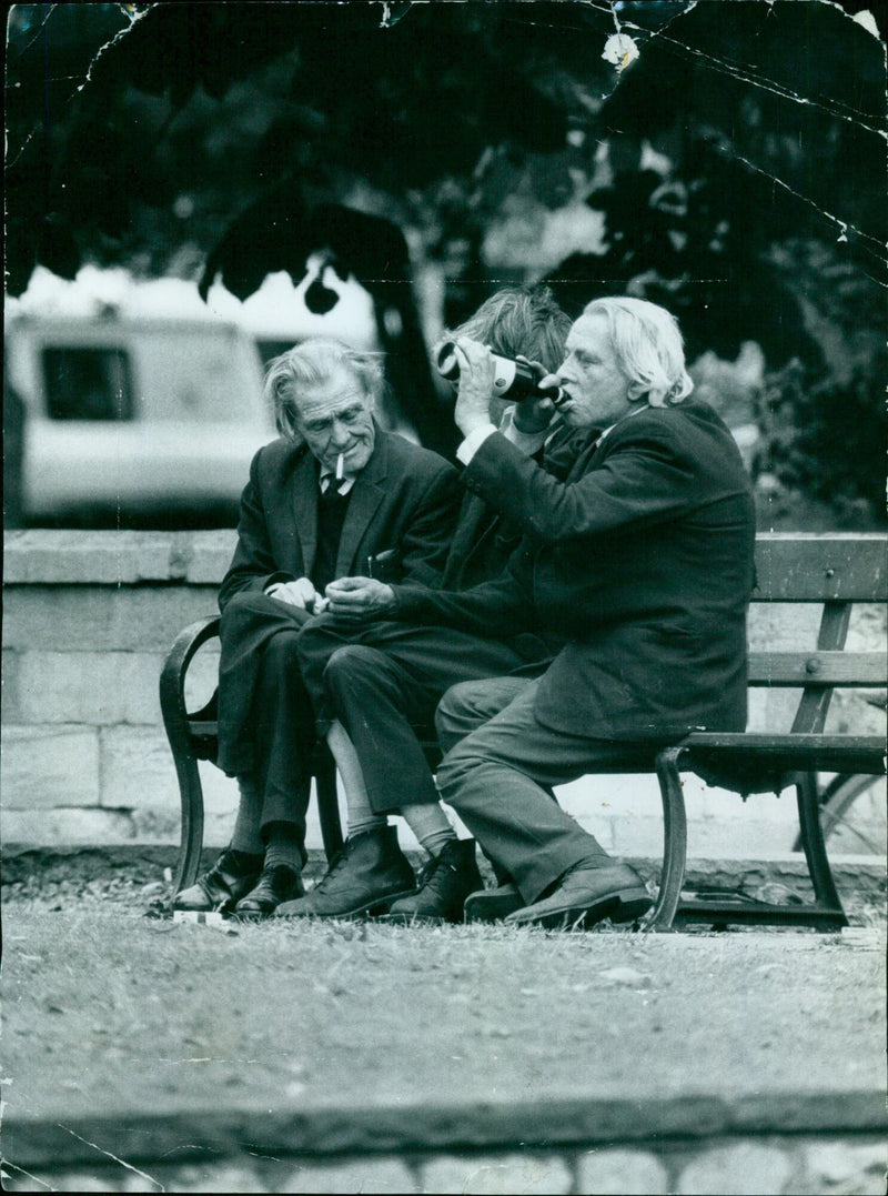 A line of vagrants on a sidewalk in Oxford, England. - Vintage Photograph