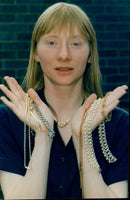 WPC Lowe displaying recovered jewellery at the Conley Police Station. - Vintage Photograph
