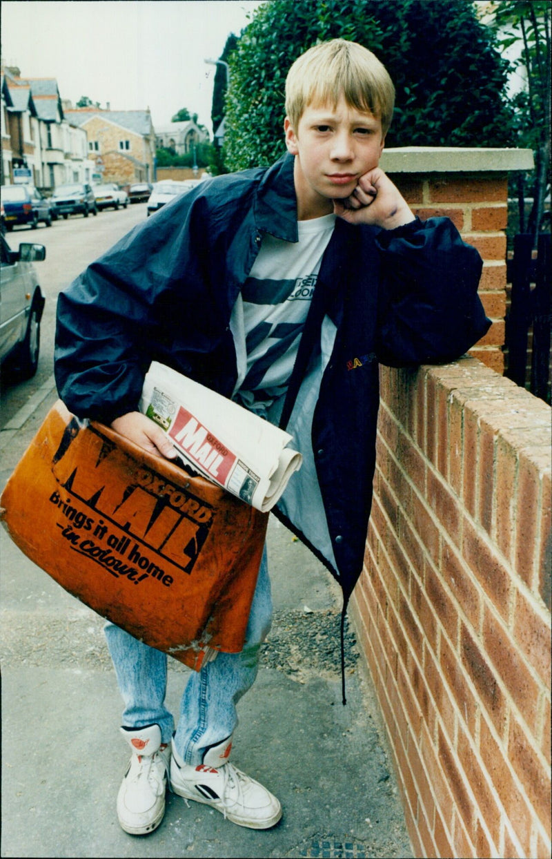 13-year-old David Henderson holds up a copy of the Oxford Mail paper to show his bike theft story. - Vintage Photograph