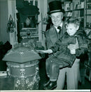 A crowd of people gathered to protest in front of the Queen's palace in London. - Vintage Photograph