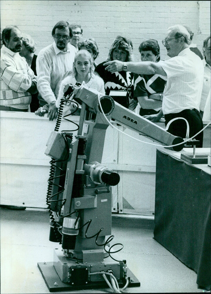 "Father and daughter embrace on a beach in August 1986." - Vintage Photograph