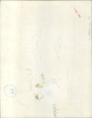 A man in a suit is walking away from the camera with a stack of mail in his hand. - Vintage Photograph