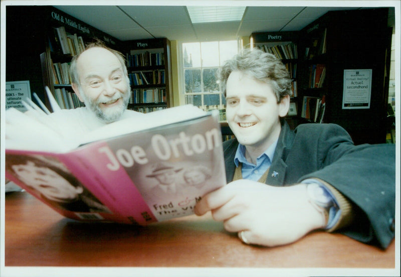 David Retter, Manager of Blackwell's 2nd Hand Department, reviews a script with James Methuen, Director of Fred & Madge by Joe Orton. - Vintage Photograph