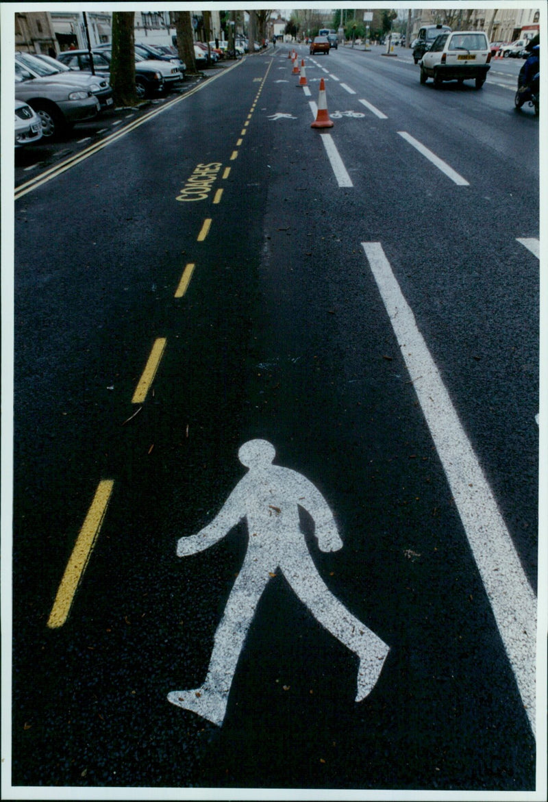 People walking in Oxford's St Giles on February 5, 2001. - Vintage Photograph