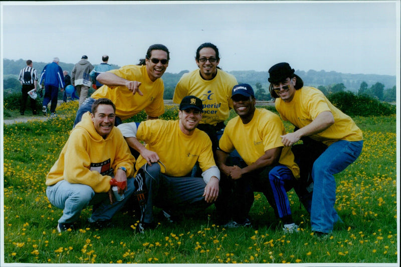Chipendales Tony Ranaudo and Jasen Johnston cut the ribbon to start a sponsored walk for cancer research. - Vintage Photograph