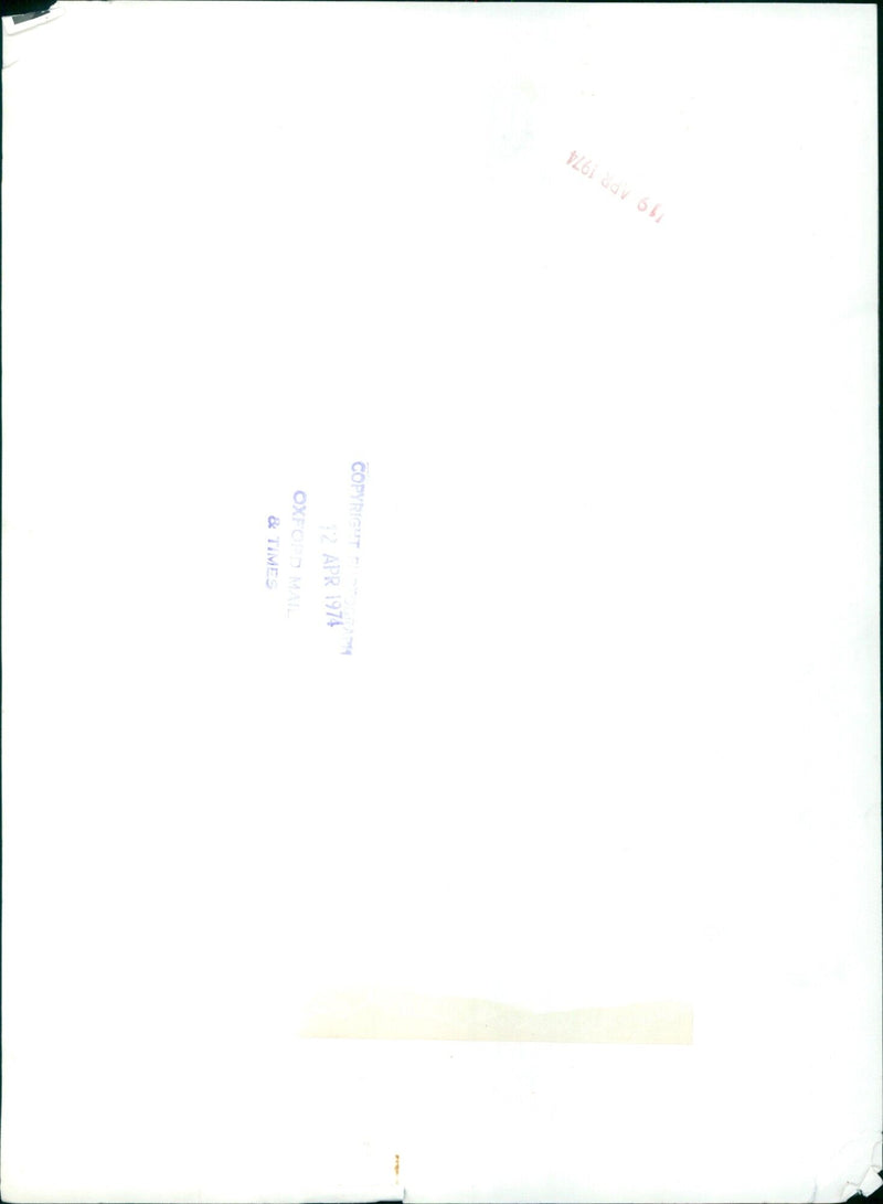 A group of people walking on a street carrying a large banner - Vintage Photograph