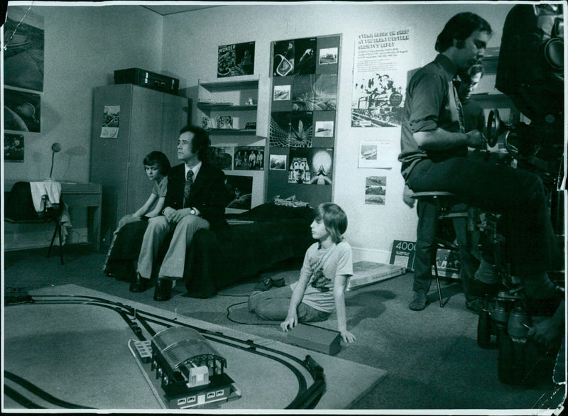 A group of people walking on a street carrying a large banner - Vintage Photograph