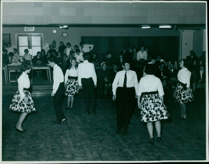 Folk dancers perform on February 5, 1966. - Vintage Photograph