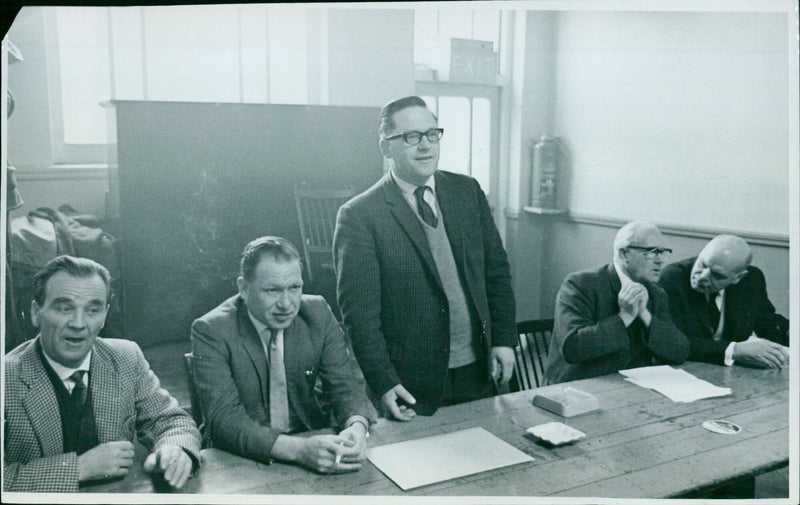 Members of the Tromstoke 9961 AON 8 Labour Transport Hour hold a meeting to discuss a strike. - Vintage Photograph