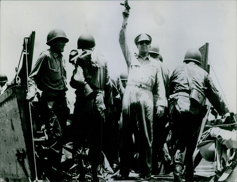 General Douglas Mac Arthur with his men on a ship, about to depart. April 14, 1964. - Vintage Photograph