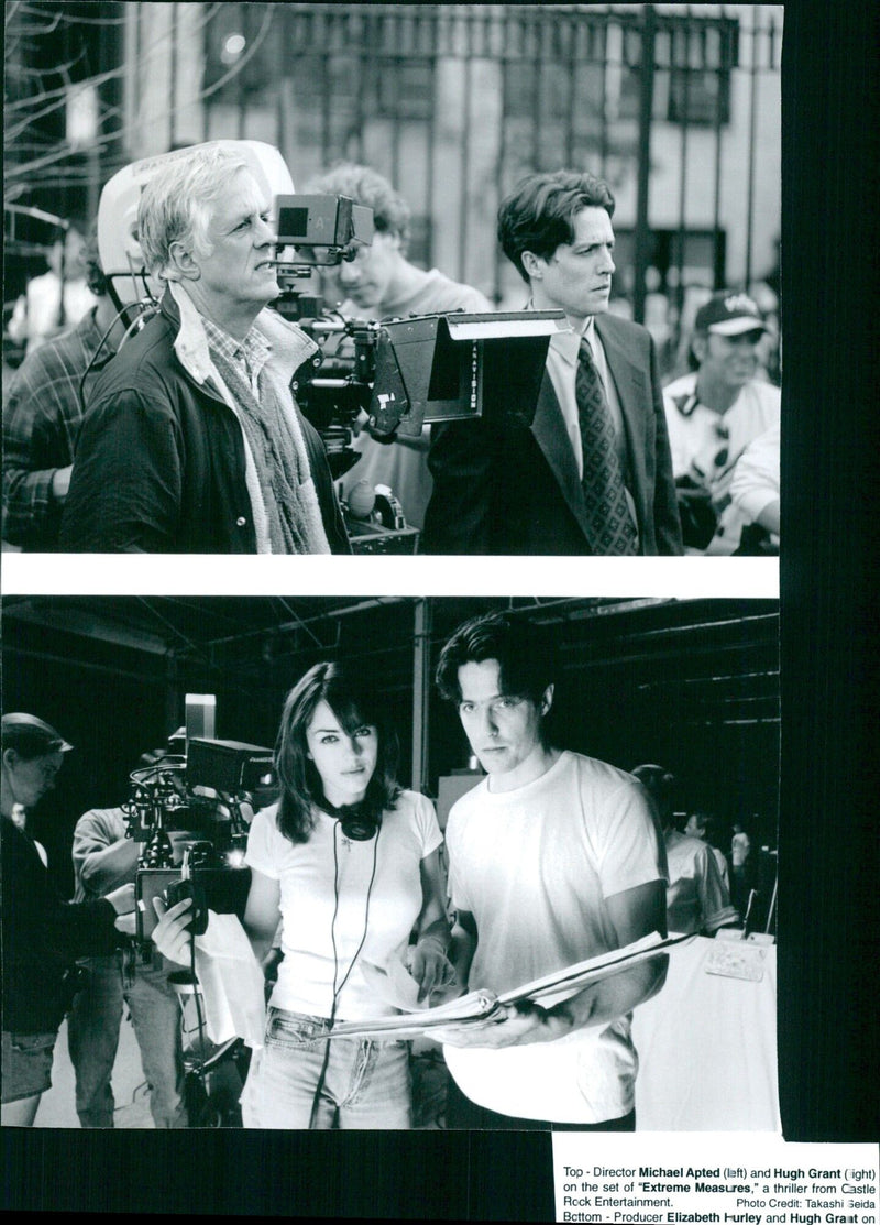 Director Michael Apted and Hugh Grant on the set of "Extreme Measures" - Vintage Photograph