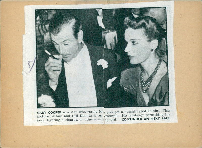 Gary Cooper and Lili Damita in a candid moment - Vintage Photograph