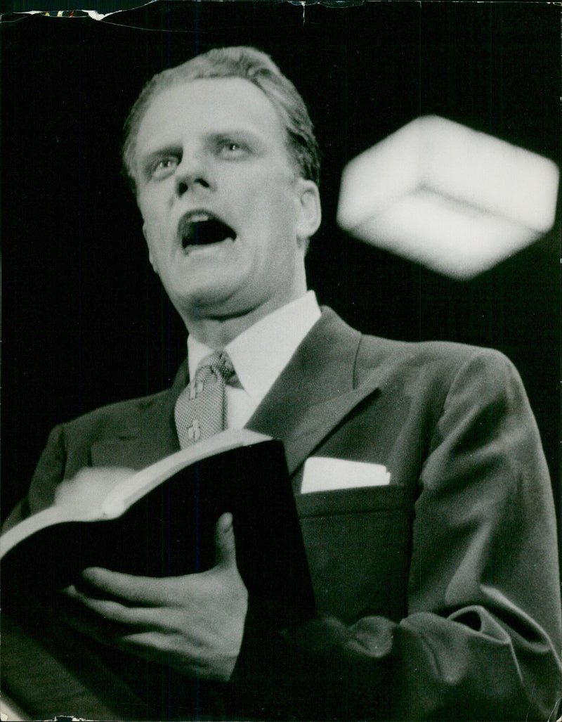 Dr. Graham promotes the Bible to newspaper people - Vintage Photograph