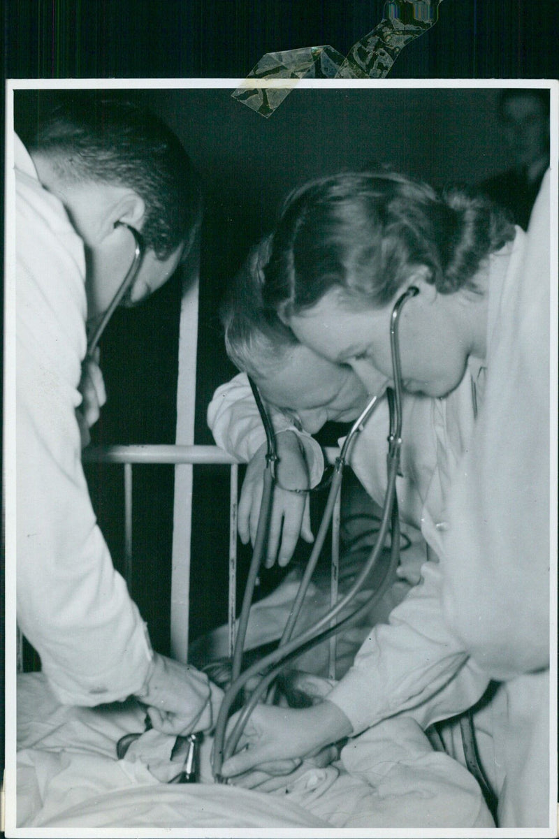 Candidates follow doctors on hospital rounds - Vintage Photograph