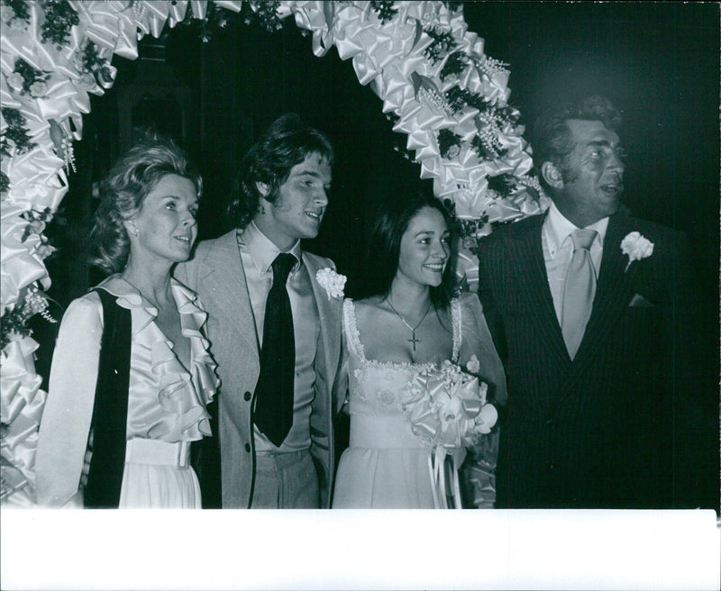 Jeanne MartiN, DINO Jr., Olivie Hussey, and Dean Martin at Torsgat in Stockholm, Sweden. - Vintage Photograph