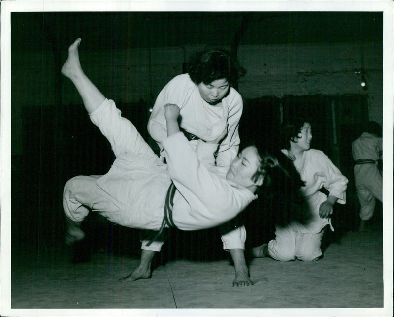 Young Japanese girls learning self-care tips - Vintage Photograph