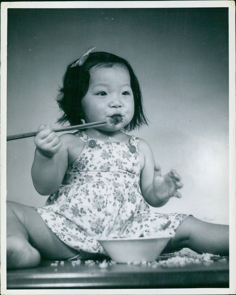 Nothing wrong with chopsticks that ingenuity won't help. - Vintage Photograph