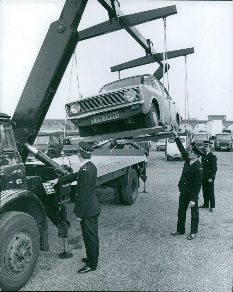 England Police towing improperly parked vehicle - Vintage Photograph