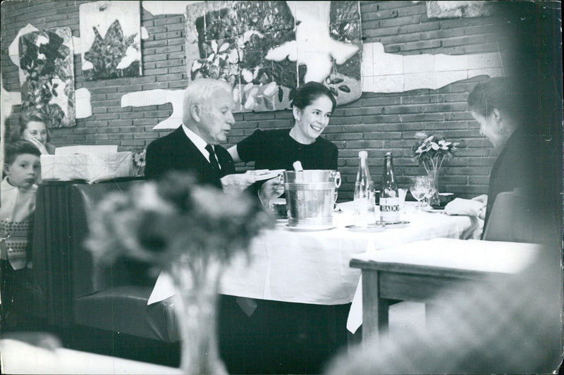 Charlie Chaplin with his wife Oona in Paris - Vintage Photograph