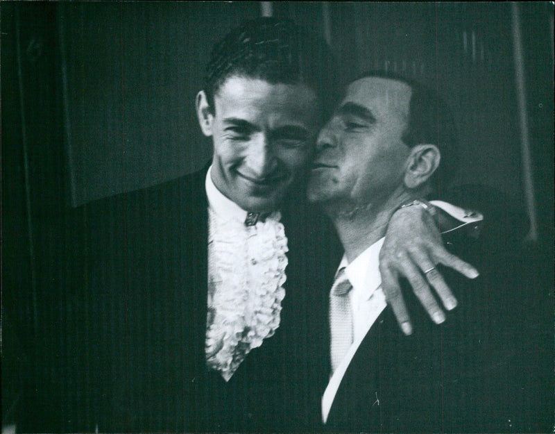 César Giron embraces his new father-in-law, the king of Marseille's "pastis," millionaire Ricard - Vintage Photograph